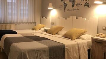 Memory-foam beds, desk, free WiFi, bed sheets