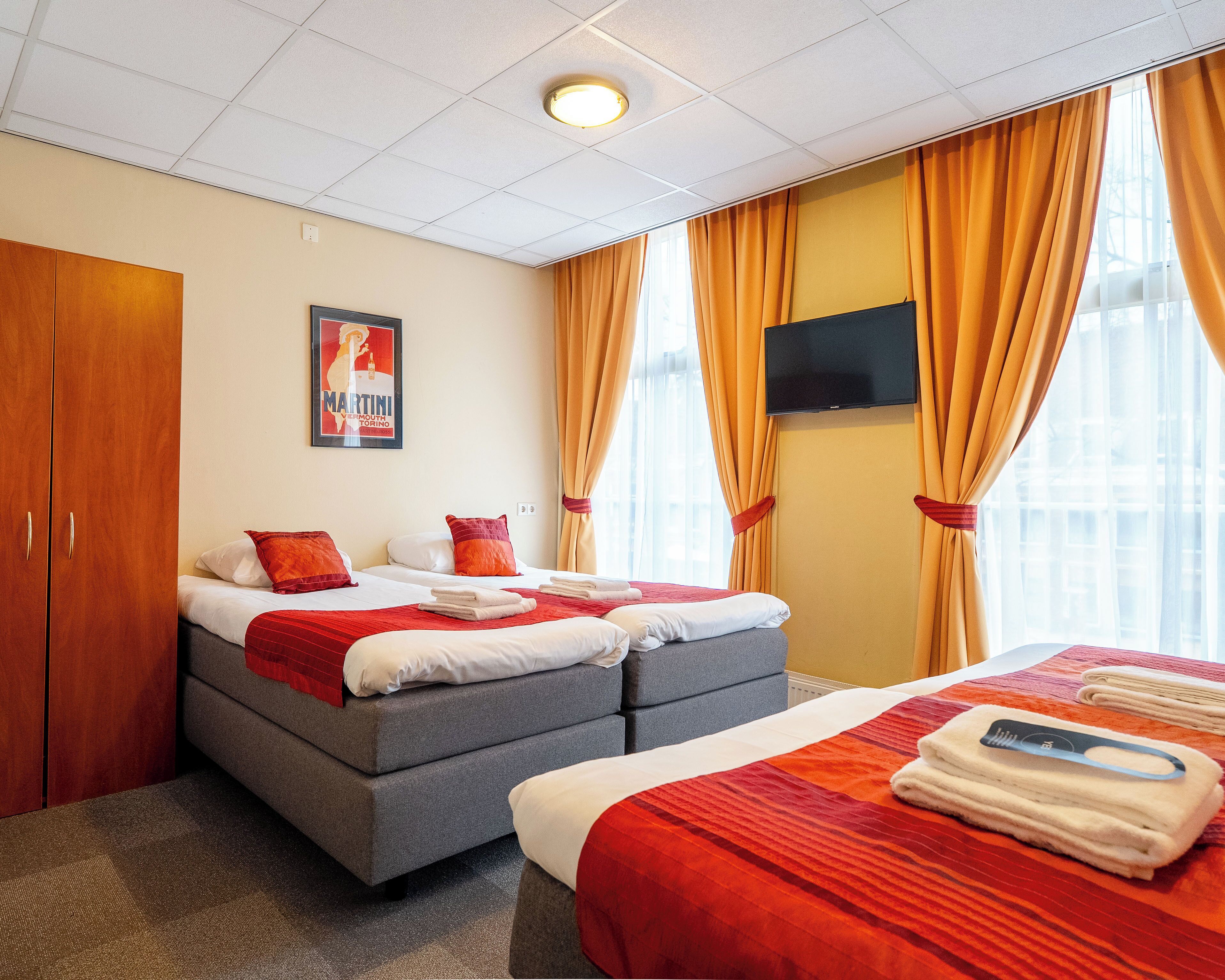 Vierpersoonskamer | Individueel gedecoreerd, individueel gemeubileerd