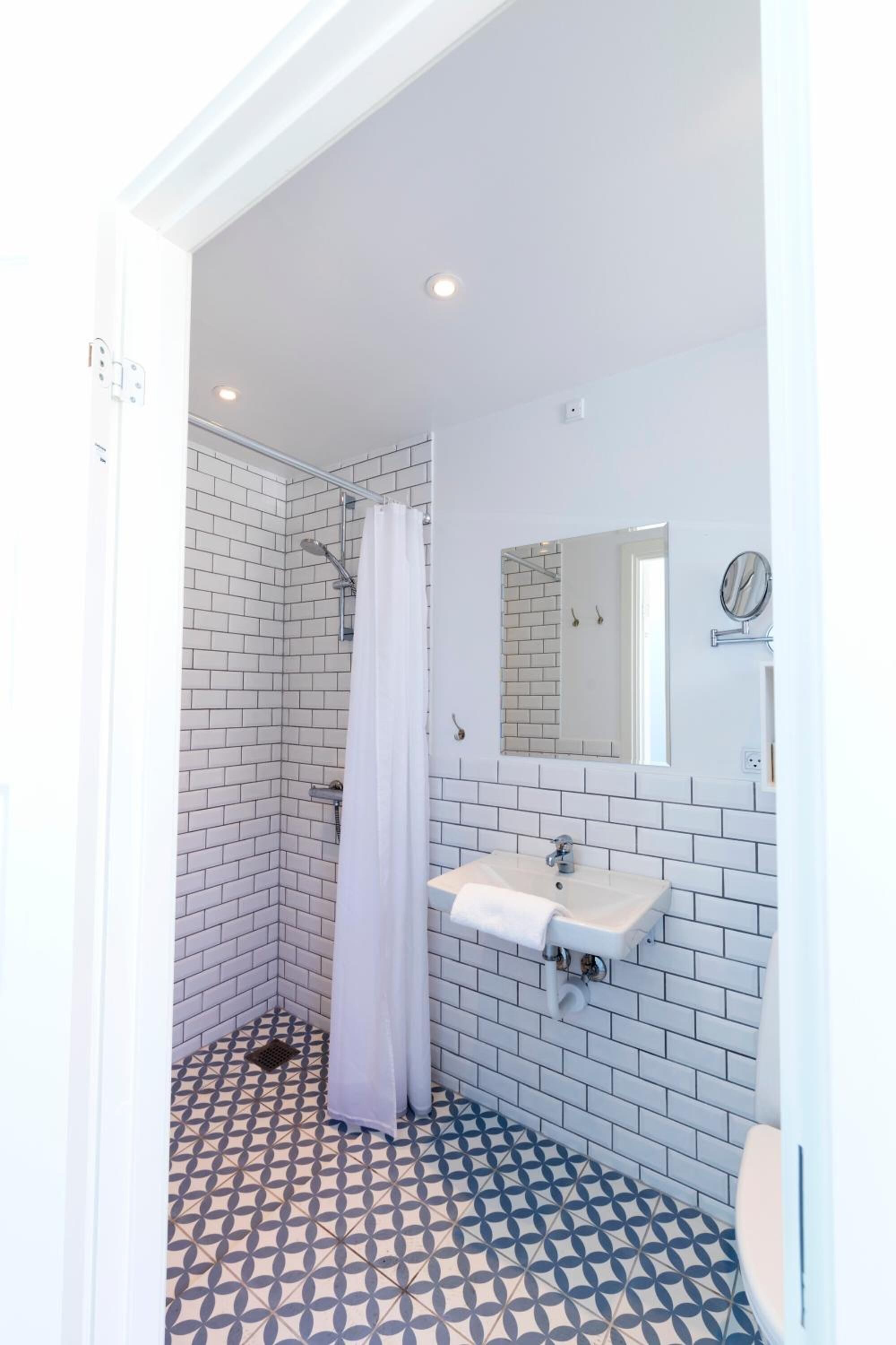 double room, private bathroom | bathroom | eco-friendly toiletries, hair dryer, slippers, towels