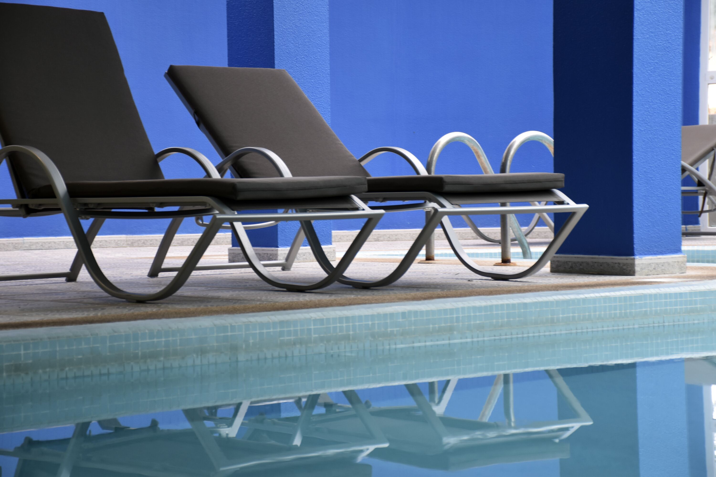 indoor pool, open 10:00 am to 6:00 pm, pool loungers
