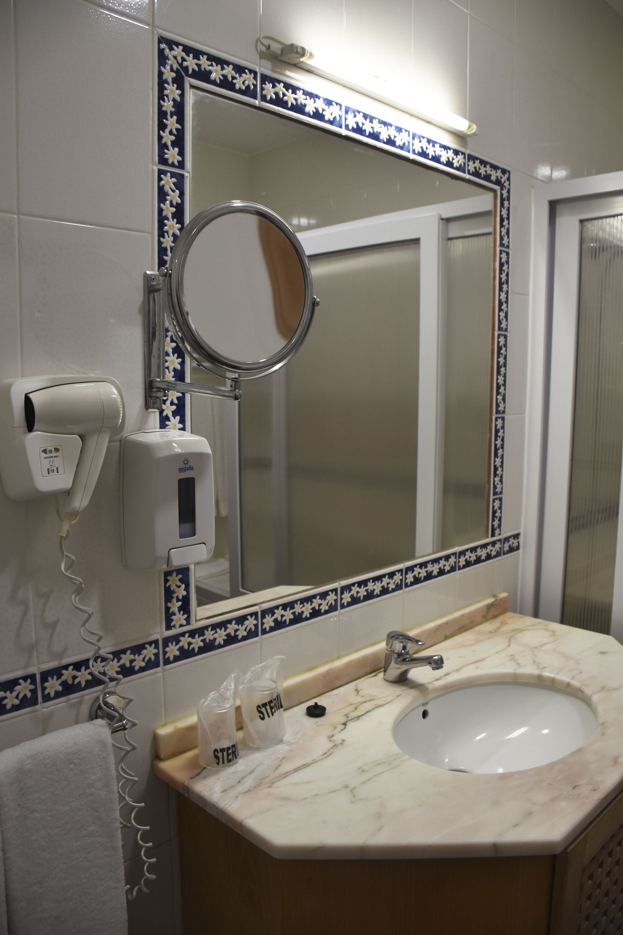 hair dryer, bidet, towels