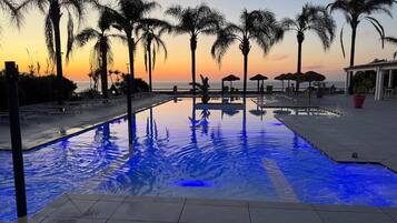 Seasonal outdoor pool, pool umbrellas, sun loungers