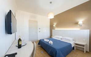 Standard Room, Sea View | In-room safe, desk, laptop workspace, travel crib - Petruso Resort (Balestrate)