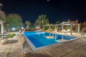 Outdoor pool, free pool cabanas, pool umbrellas