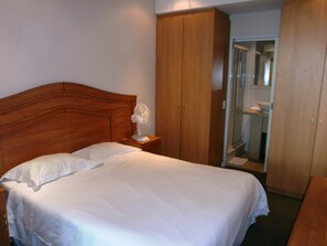 Standard Apartment, 3 Bedrooms (Self Servicing & Self Catering) | 3 bedrooms, desk, laptop workspace, iron/ironing board