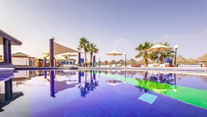 Indoor pool, outdoor pool, open 9 AM to 7 PM, pool umbrellas - Royal Beach Hotel & Resort (Dibba)