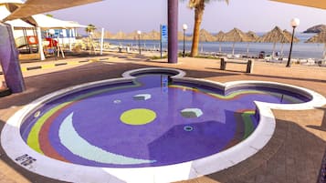 Indoor pool, outdoor pool, open 9 AM to 7 PM, pool umbrellas