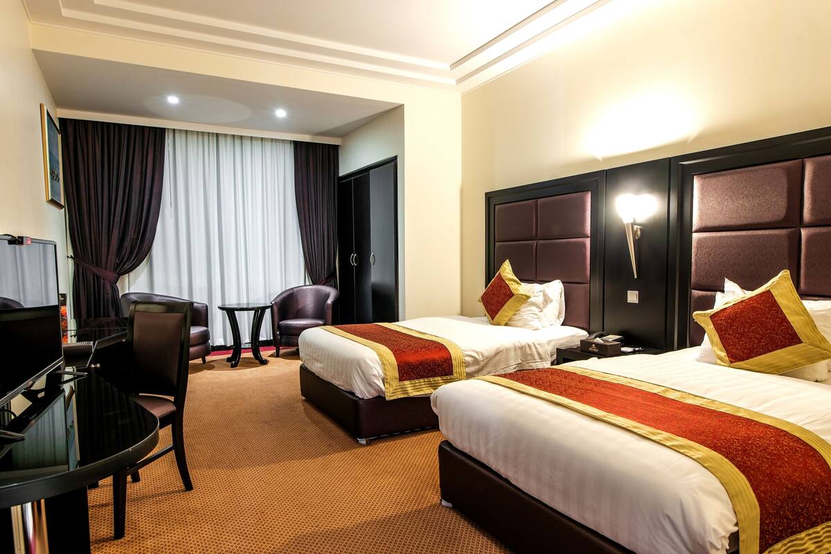 Executive Suite | In-room safe, desk, iron/ironing board (on request), cribs (free)