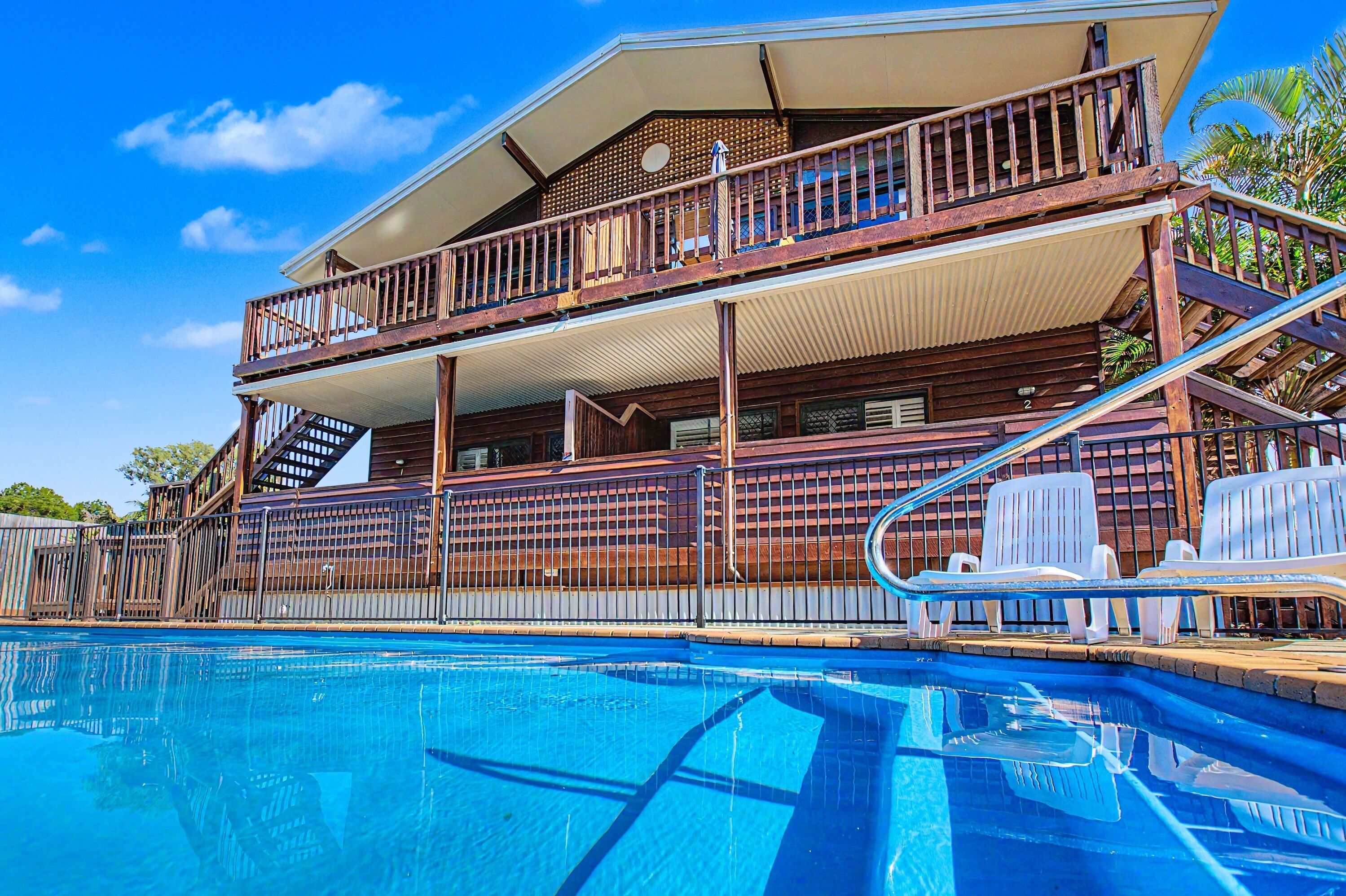 Outdoor pool, pool umbrellas, pool loungers