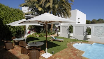 2 outdoor pools, pool umbrellas, pool loungers