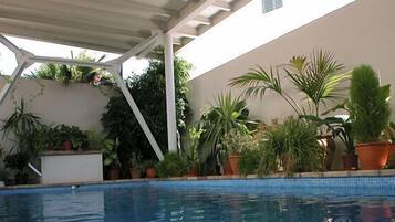 2 outdoor pools, pool umbrellas, pool loungers