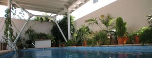 2 outdoor pools, pool umbrellas, pool loungers