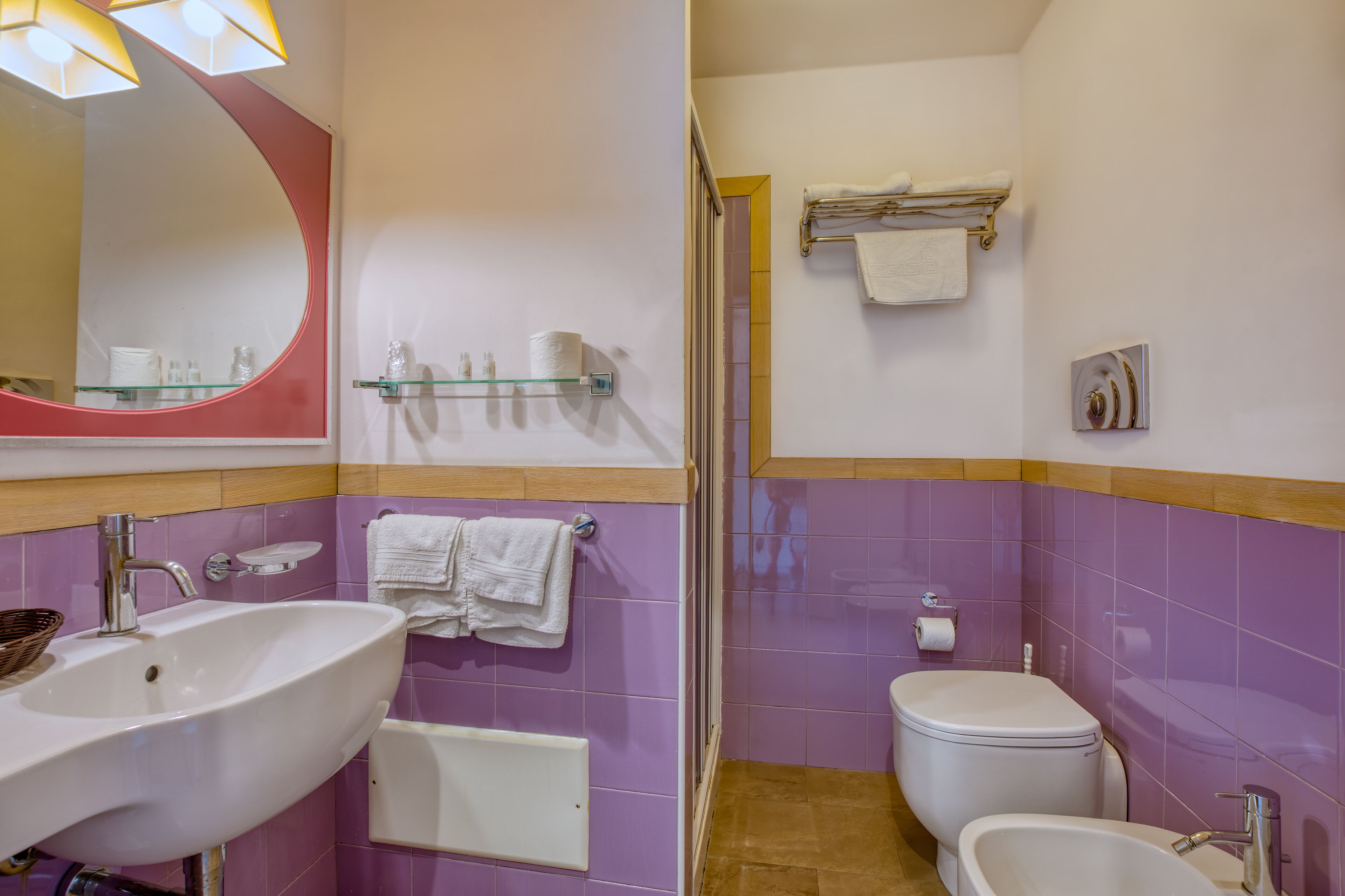 shower, hair dryer, bidet, towels