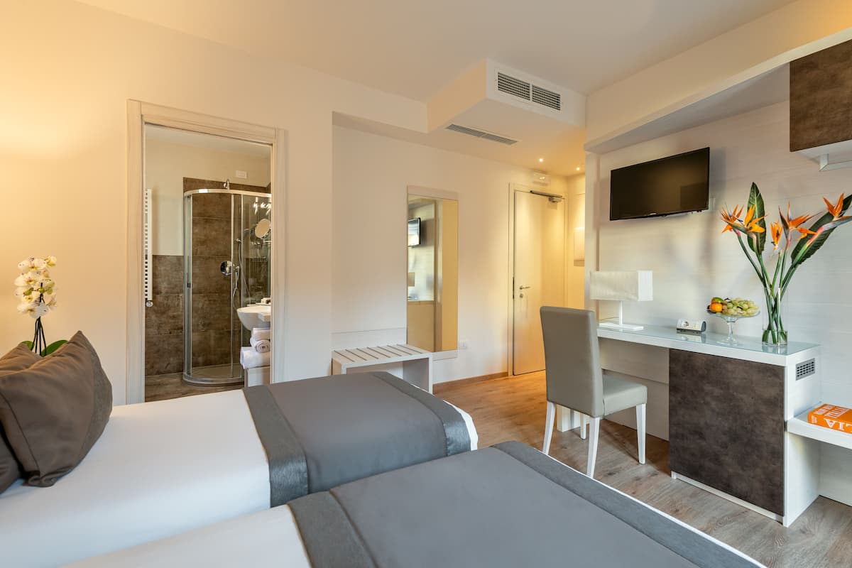 Premium bedding, down duvets, minibar, in-room safe