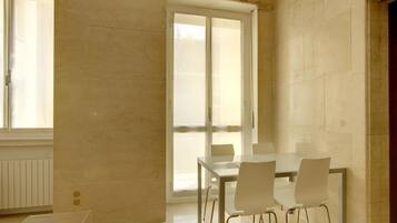 Large Studio Apartment, Via Pergolesi 31 | Living area | 32-inch flat-screen TV with satellite channels, LCD TV, DVD player
