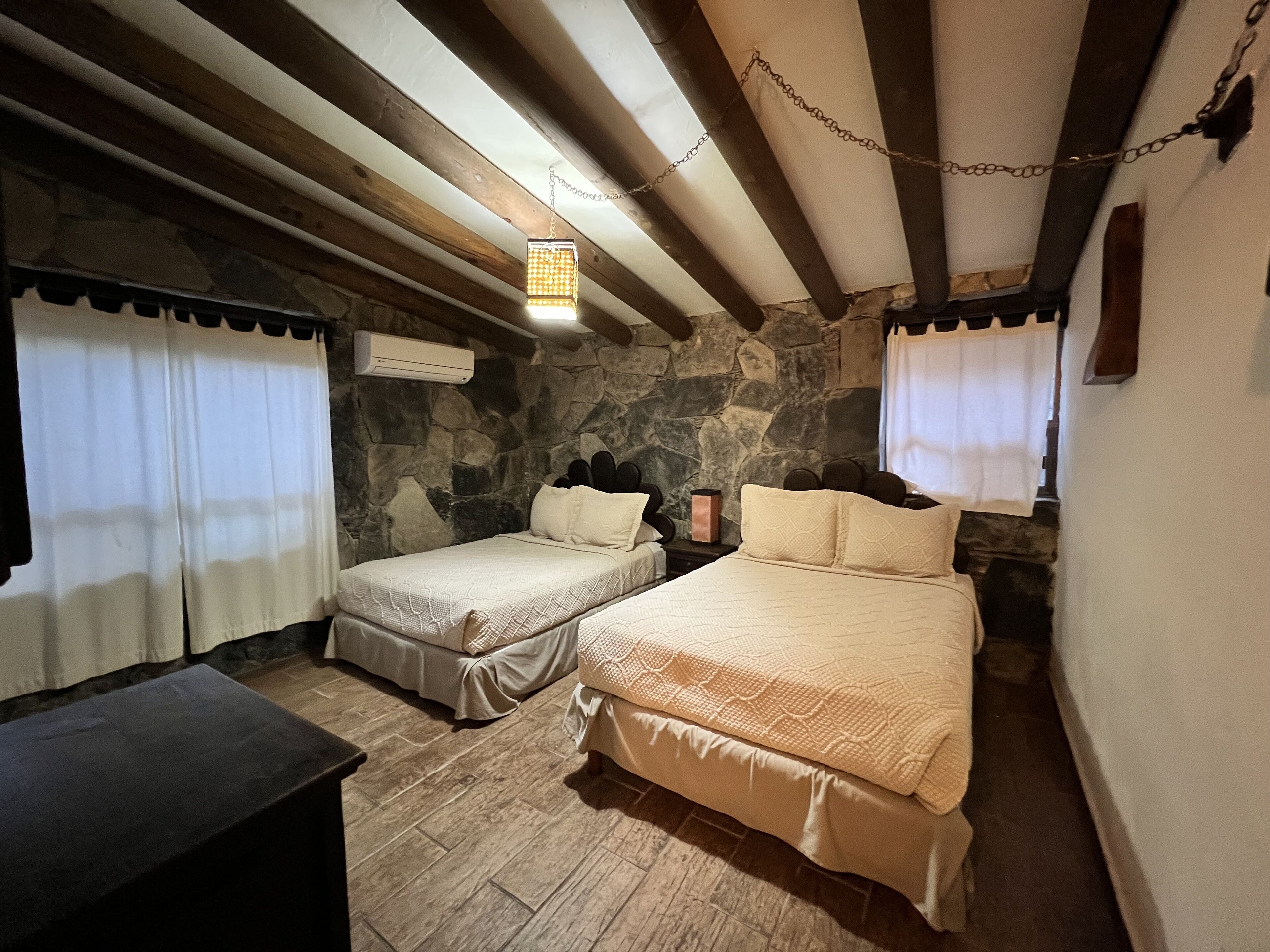 cabin, 2 bedrooms, fireplace | blackout curtains, iron/ironing board, free wifi, bed sheets