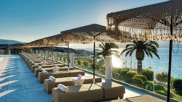 Indoor pool, outdoor pool, pool umbrellas, sun loungers