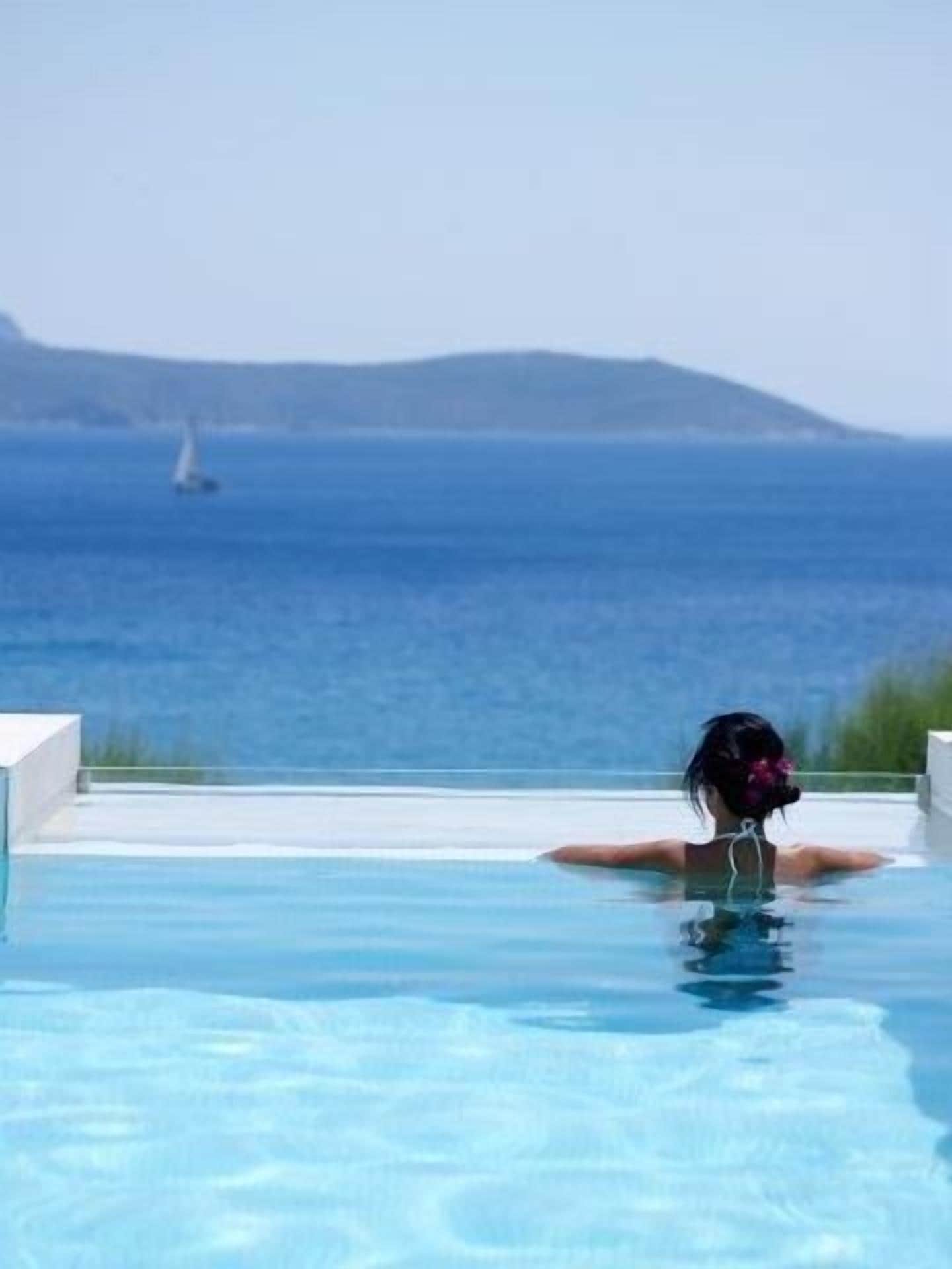 Suite, piscina privada ( Blu ) | Minibar, caja fuerte, escritorio y wifi gratis