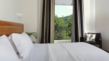 Egyptian cotton sheets, premium bedding, down duvets, minibar