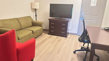 50-inch flat-screen TV with cable channels, TV