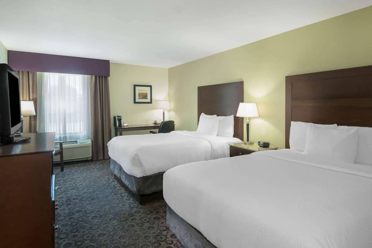 Premium bedding, down comforters, pillowtop beds, desk