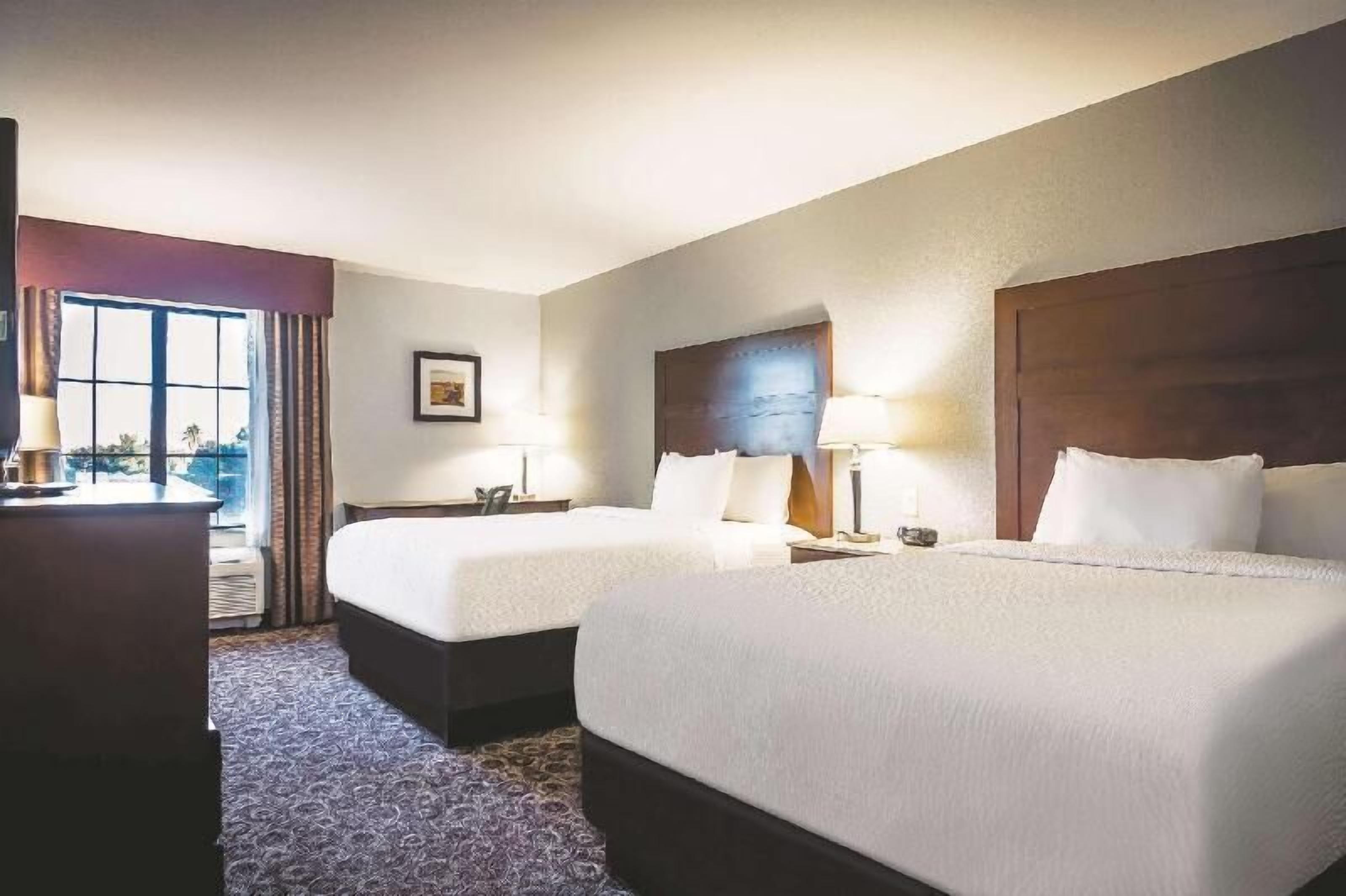 Premium bedding, down duvets, pillow-top beds, desk