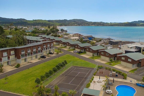 On the beach, white sand, beach towels