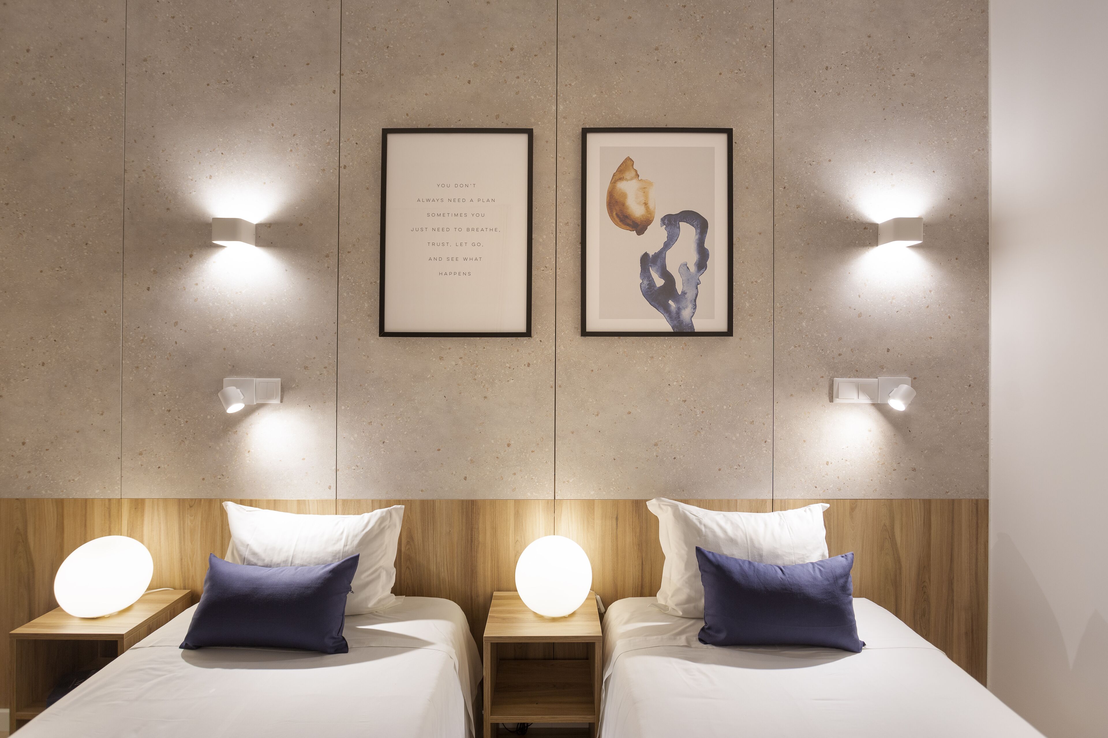 standard twin room | in-room safe, individually decorated, desk, blackout curtains