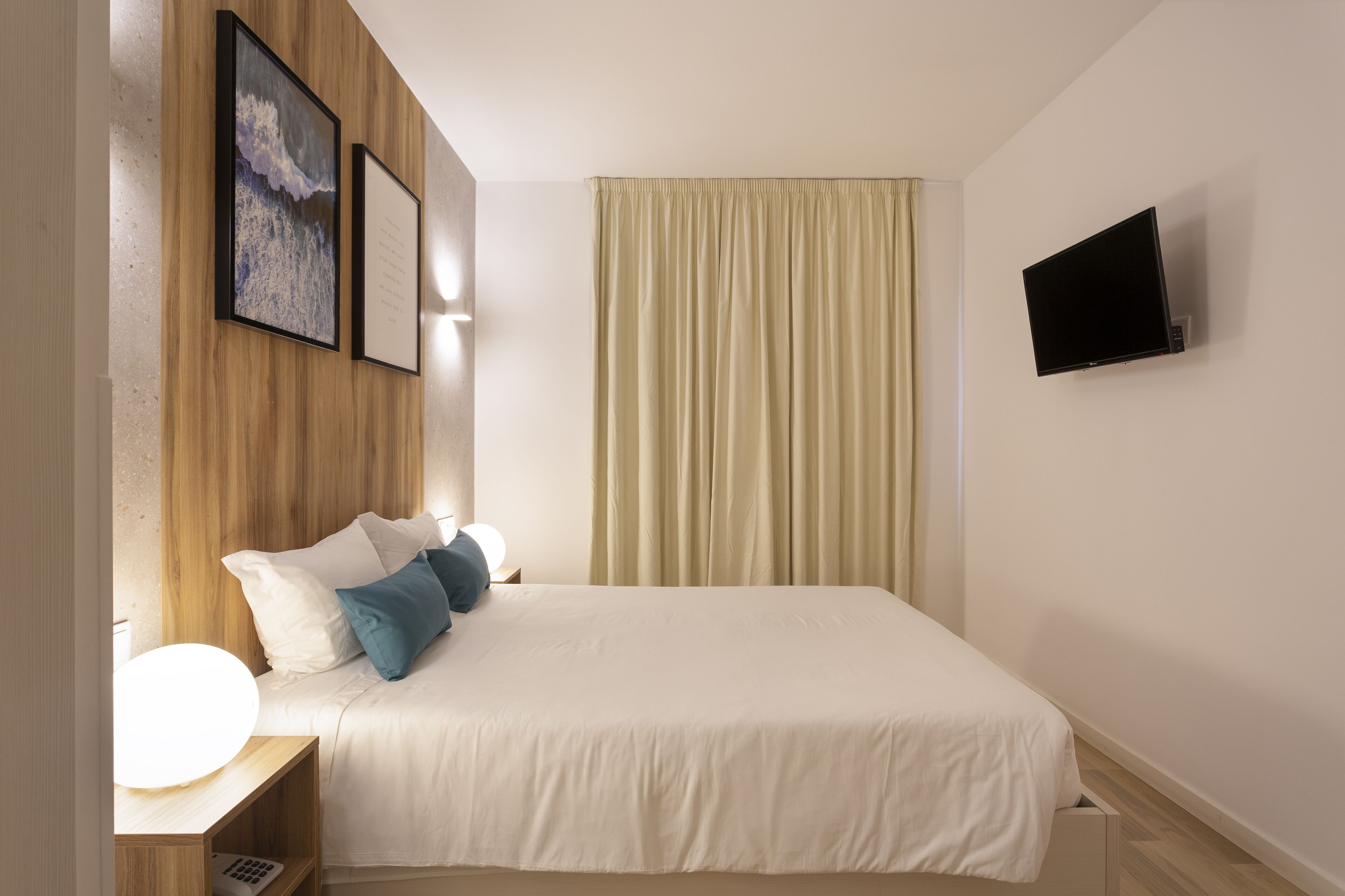 standard double room | in-room safe, individually decorated, desk, blackout curtains
