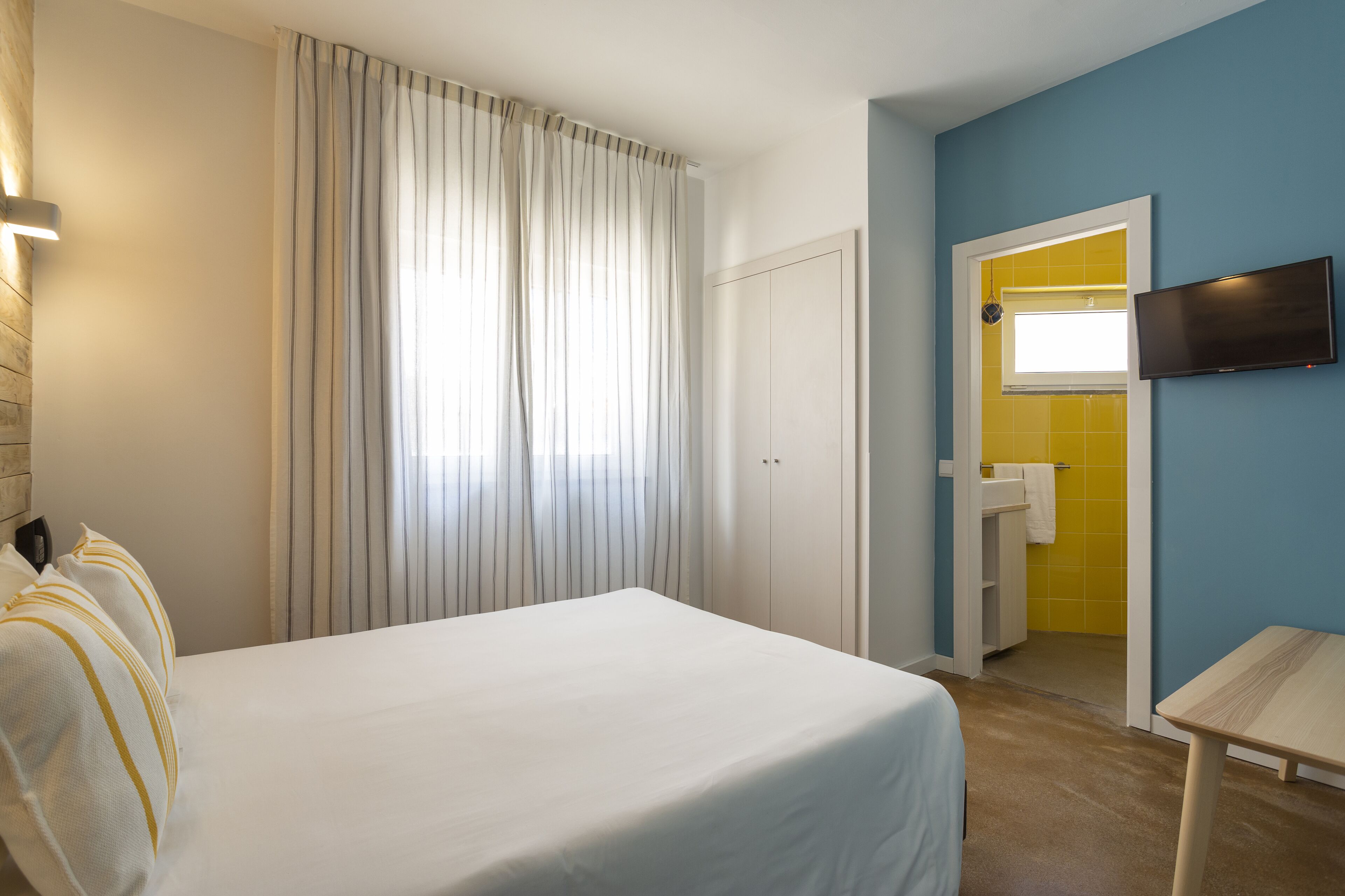 single room | in-room safe, individually decorated, desk, blackout curtains