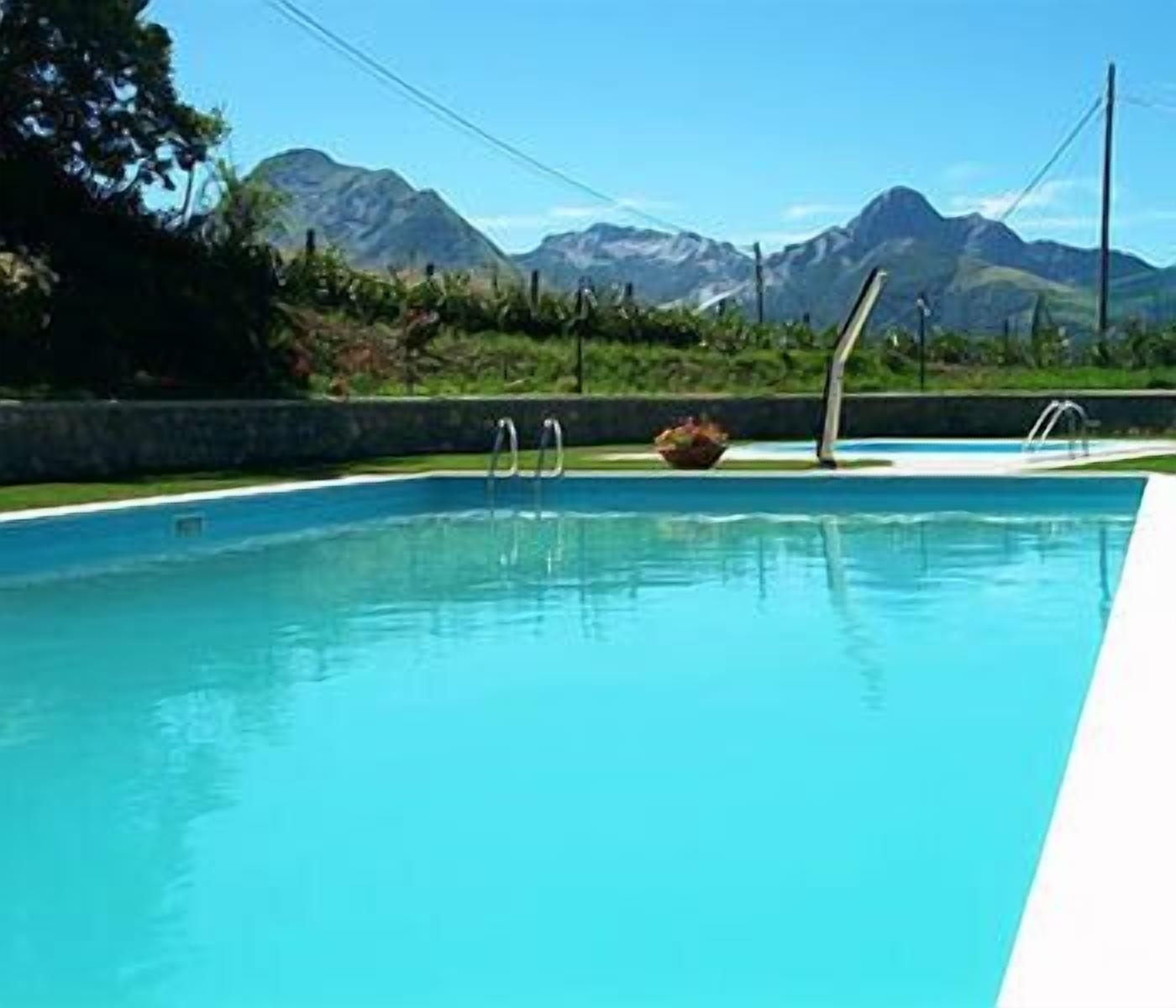 2 outdoor pools, open 8:00 am to 7:00 pm, pool umbrellas, pool loungers