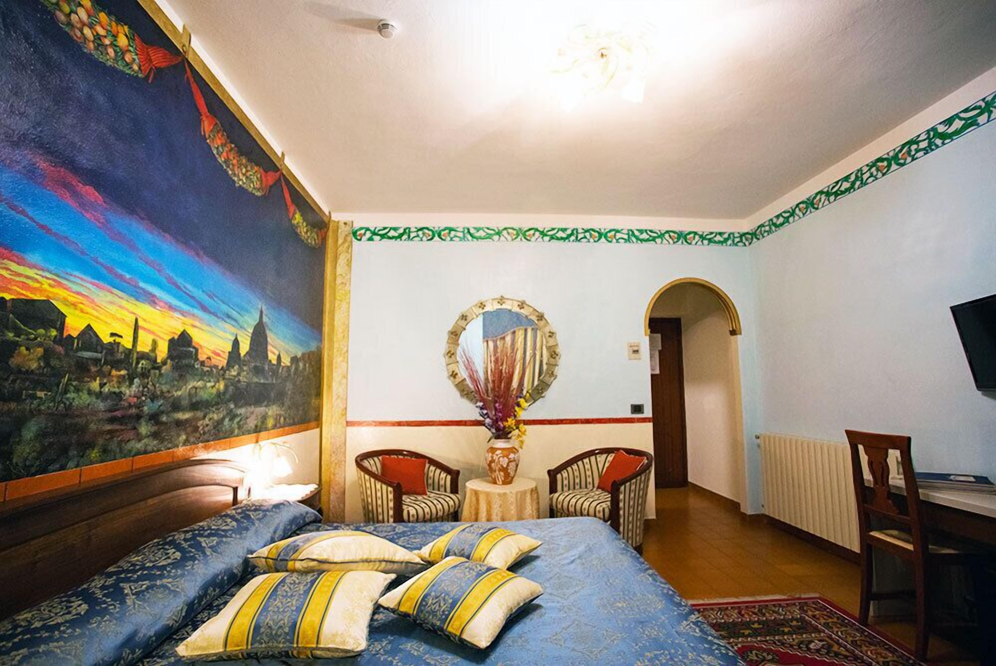 superior room | in-room safe, individually decorated, desk, laptop workspace