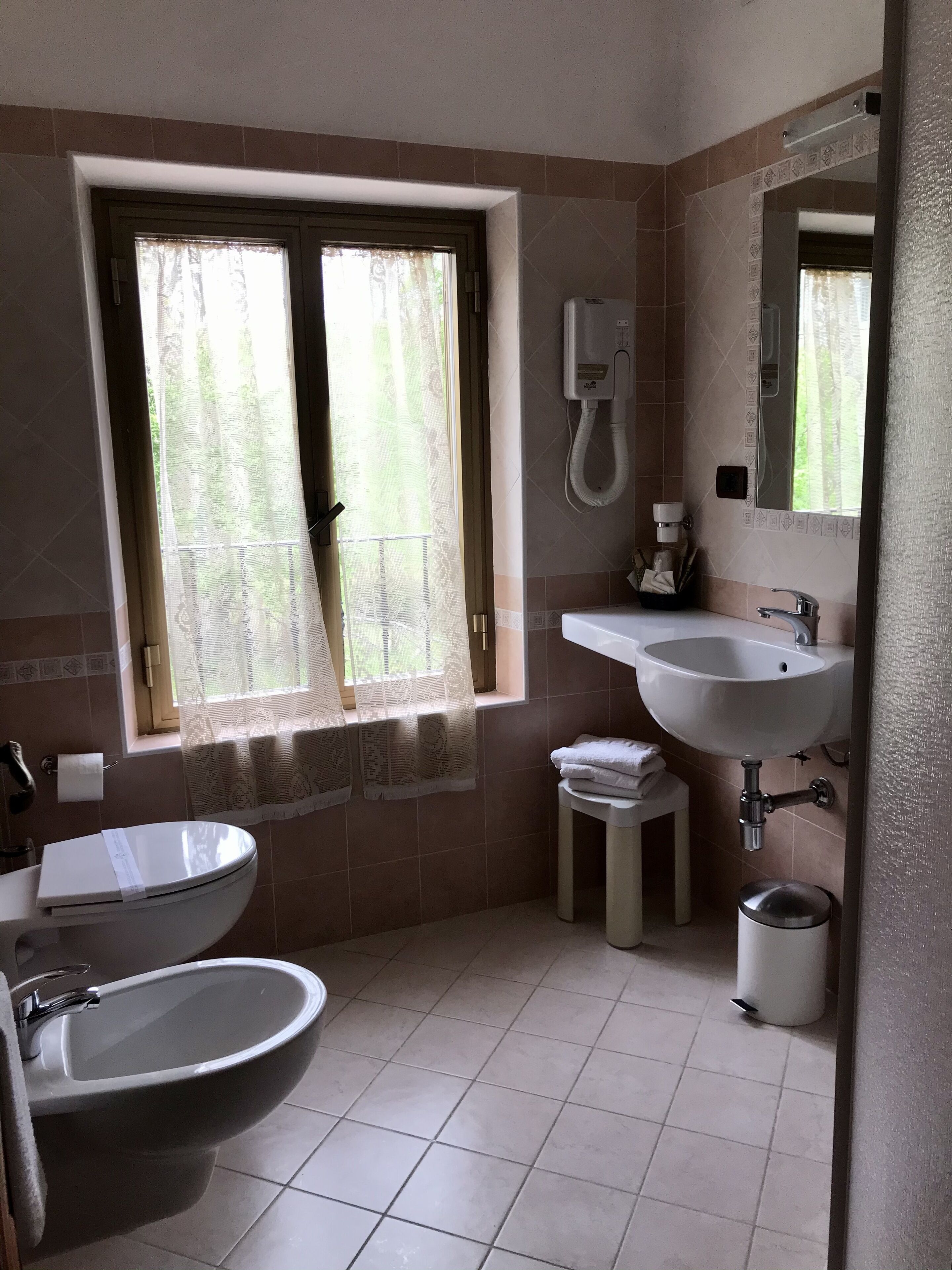 family room | bathroom | shower, free toiletries, hair dryer, towels