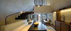 Deluxe Suite, 2 Bedrooms | Living area