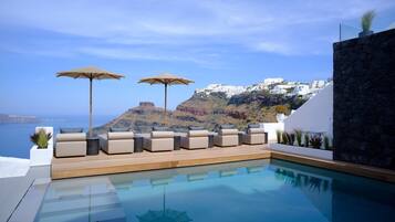 Seasonal outdoor pool, pool umbrellas, sun loungers