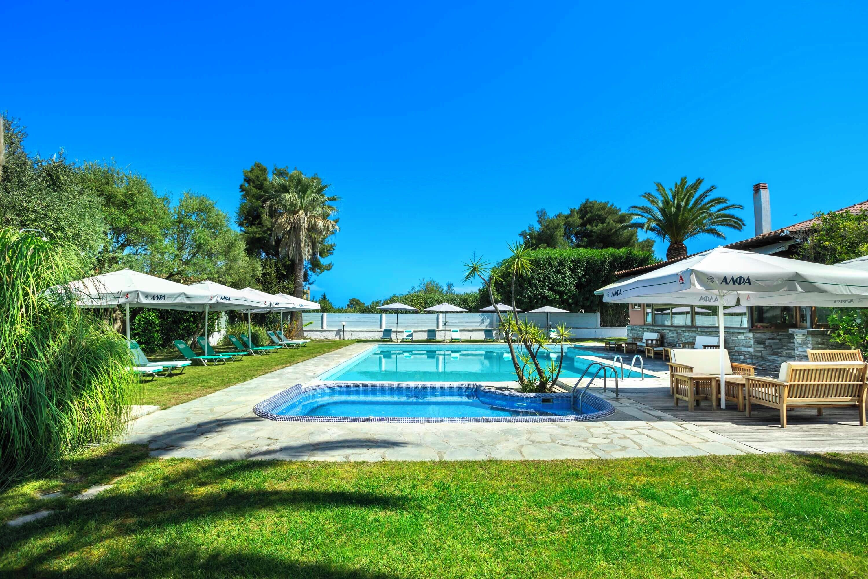 2 outdoor pools, pool umbrellas, pool loungers