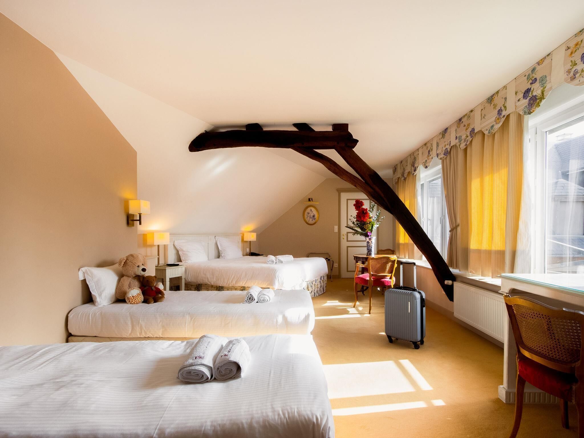 Family Room, Multiple Beds | Minibar, in-room safe, individually decorated, individually furnished