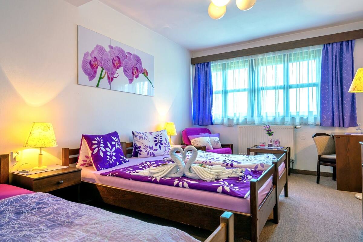 Triple Room | Desk, blackout drapes, WiFi (free), bed sheets