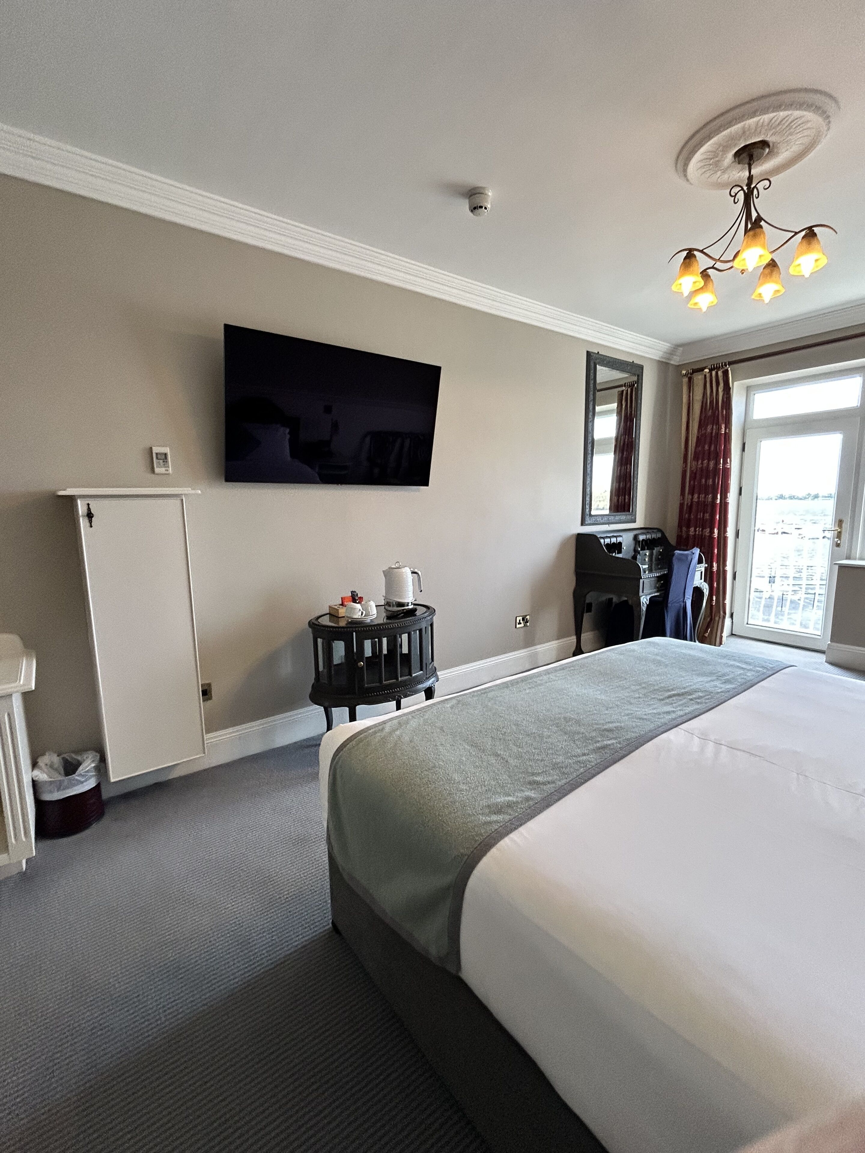 superior double room, lake view | in-room safe, desk, laptop workspace, iron/ironing board
