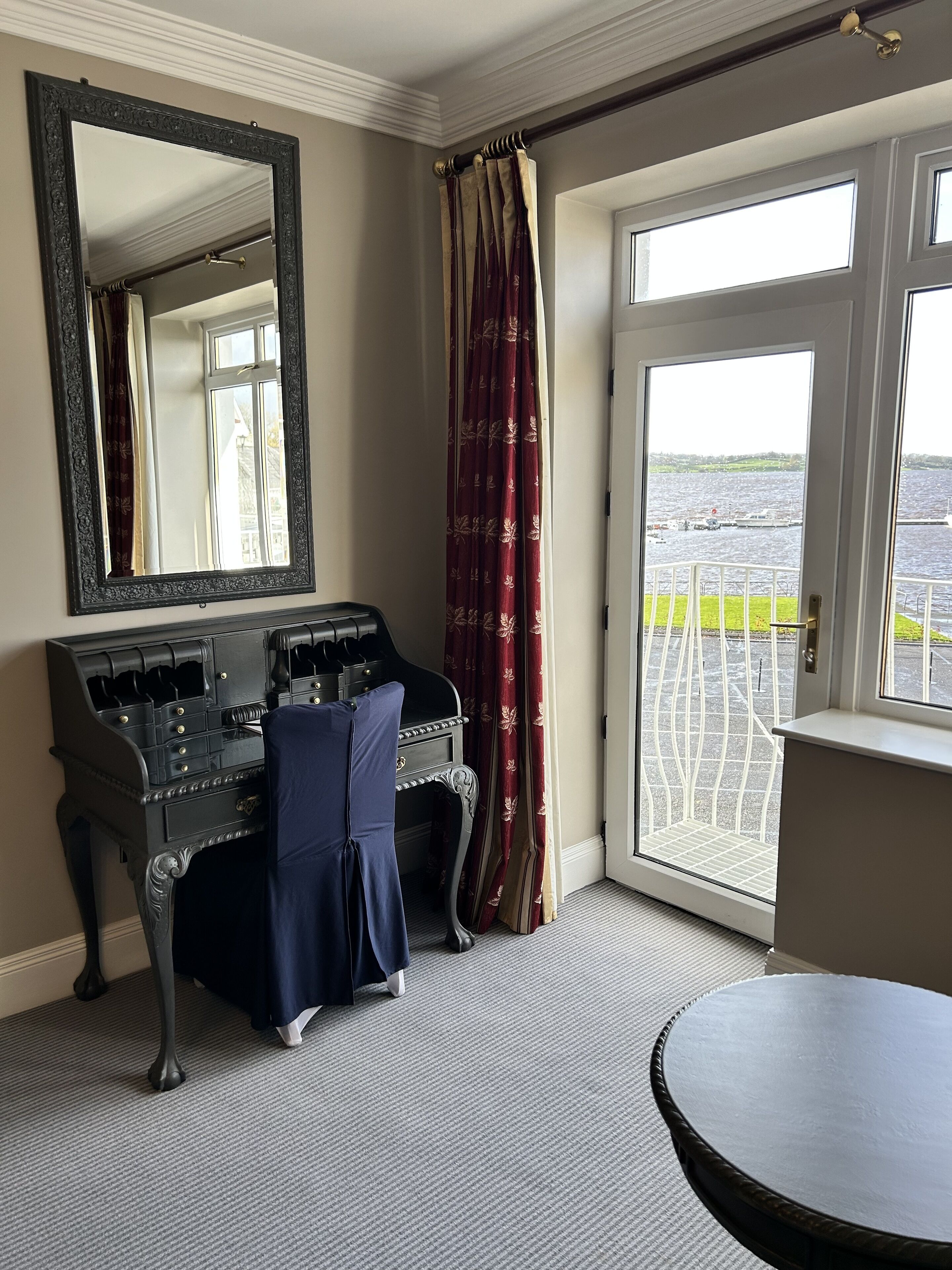 superior double room, lake view | in-room safe, desk, laptop workspace, iron/ironing board