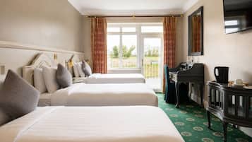Standard Triple Room | In-room safe, desk, laptop workspace, iron/ironing board