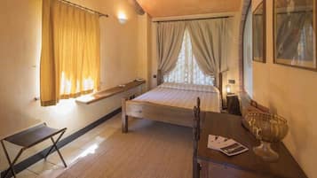 Suite Deluxe | 1 dormitorio, ropa de cama de alta calidad, minibar y caja fuerte
