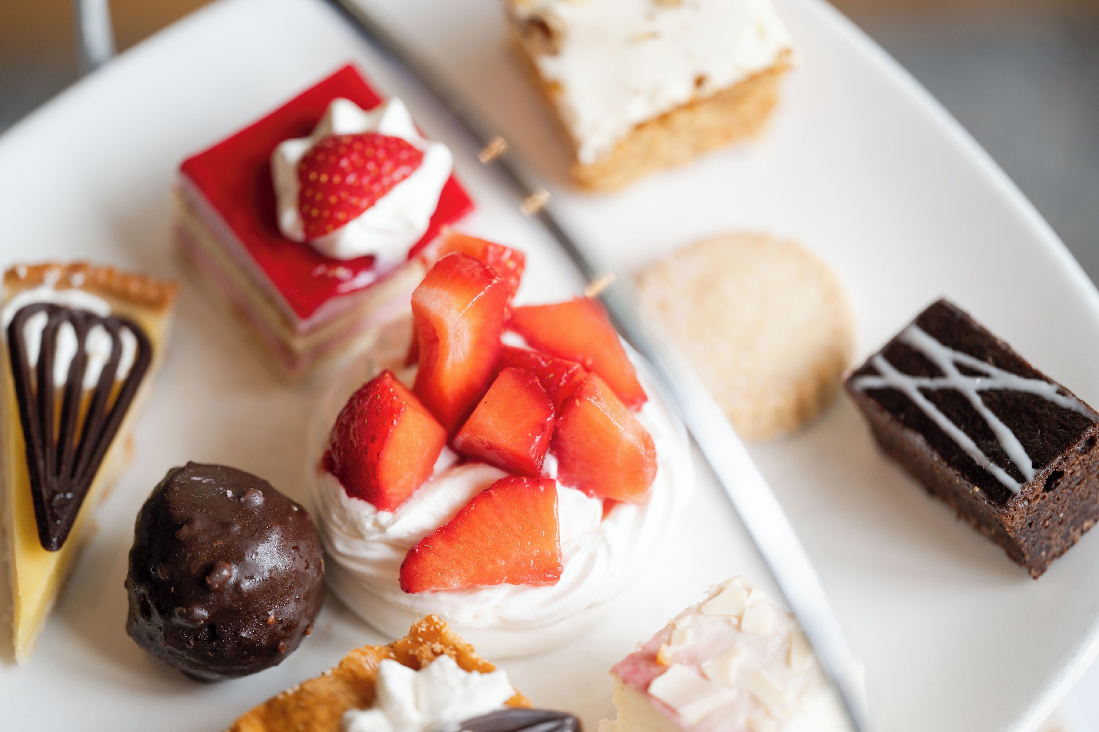 A variety of desserts on a plate.