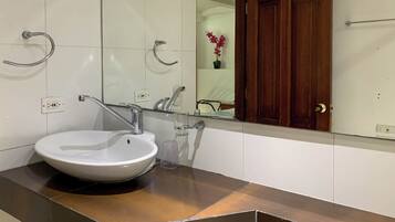 Deluxe Triple Room | Bathroom | Combined shower/tub, rainfall showerhead, hair dryer (on request)