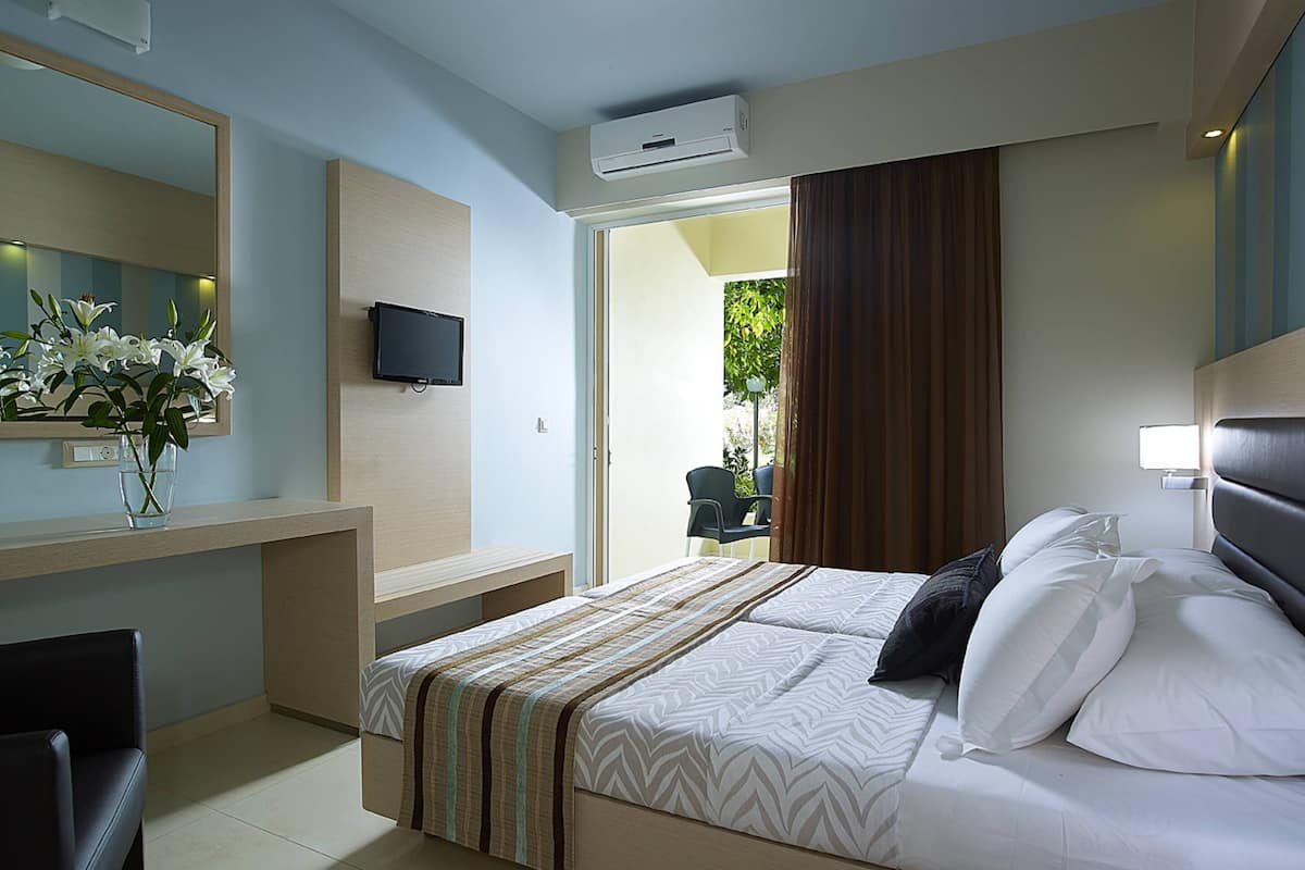 superior room, garden view | in-room safe, free wifi, bed sheets