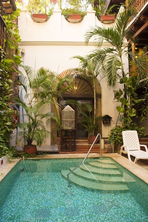 Outdoor pool, open 9:00 AM to 9:00 PM, sun loungers