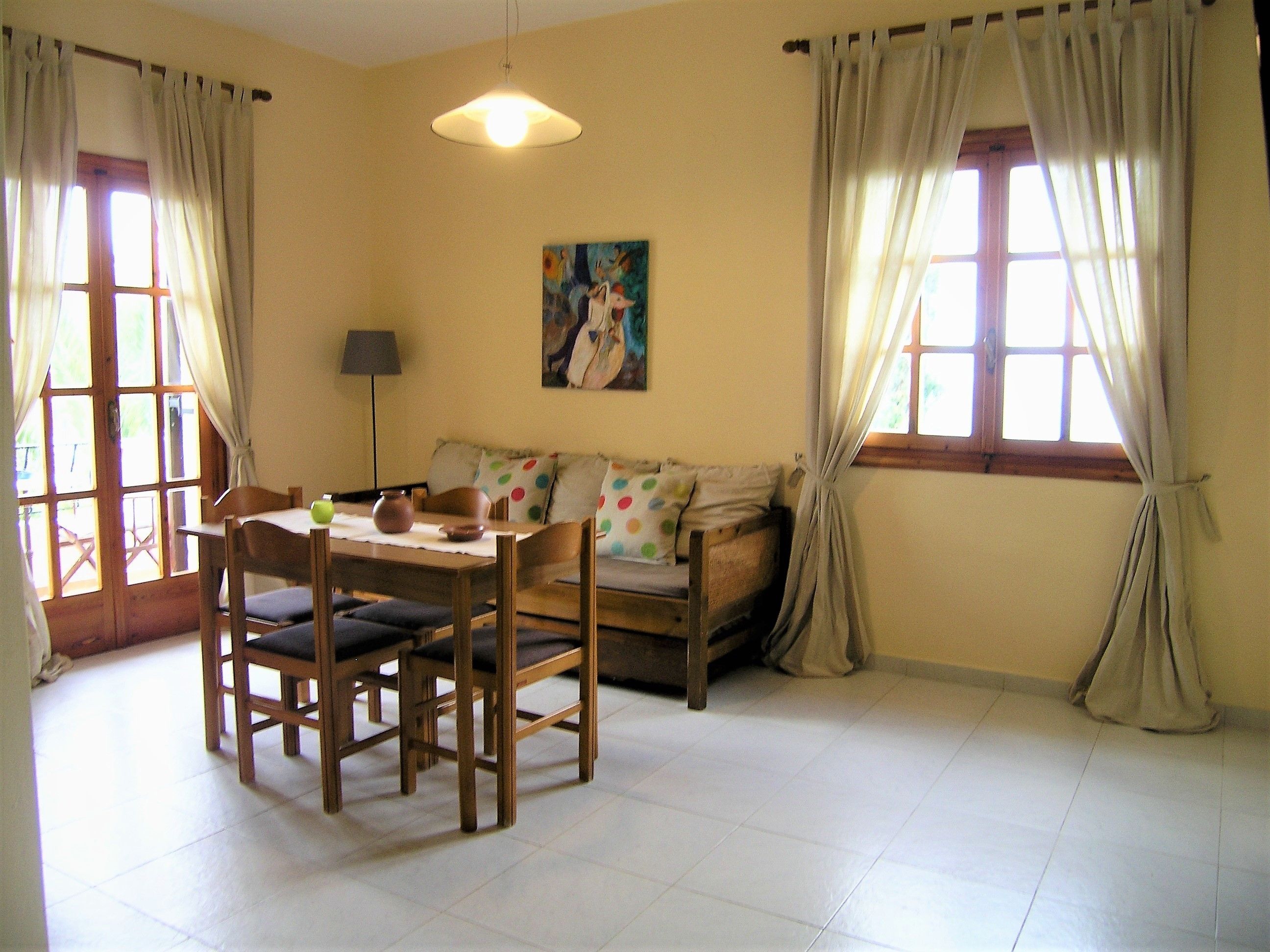Apartment, 1 Bedroom, Bay View | Living area | Flat-screen TV, DVD player