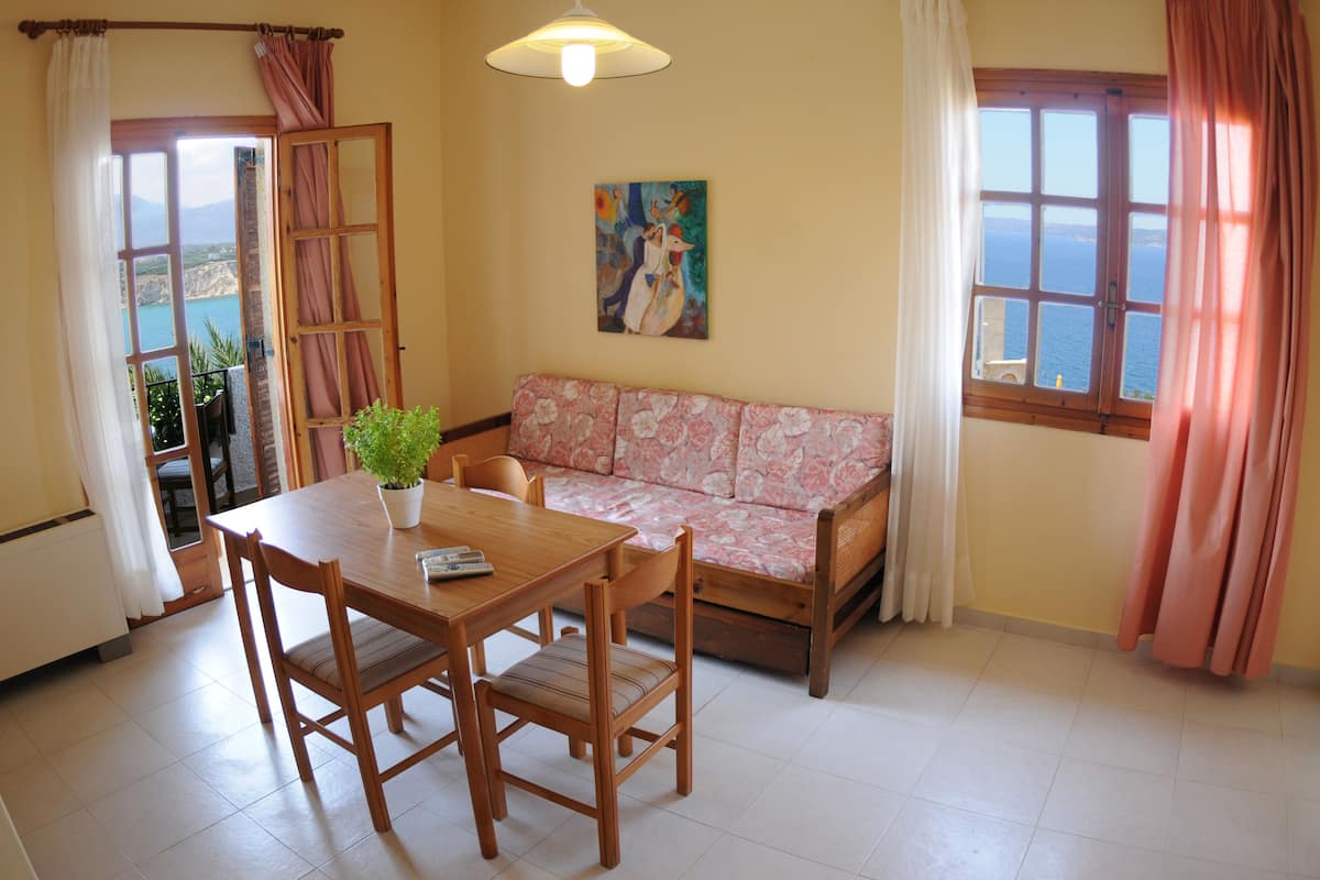 Apartment, 1 Bedroom | Living room | Flat-screen TV, DVD player