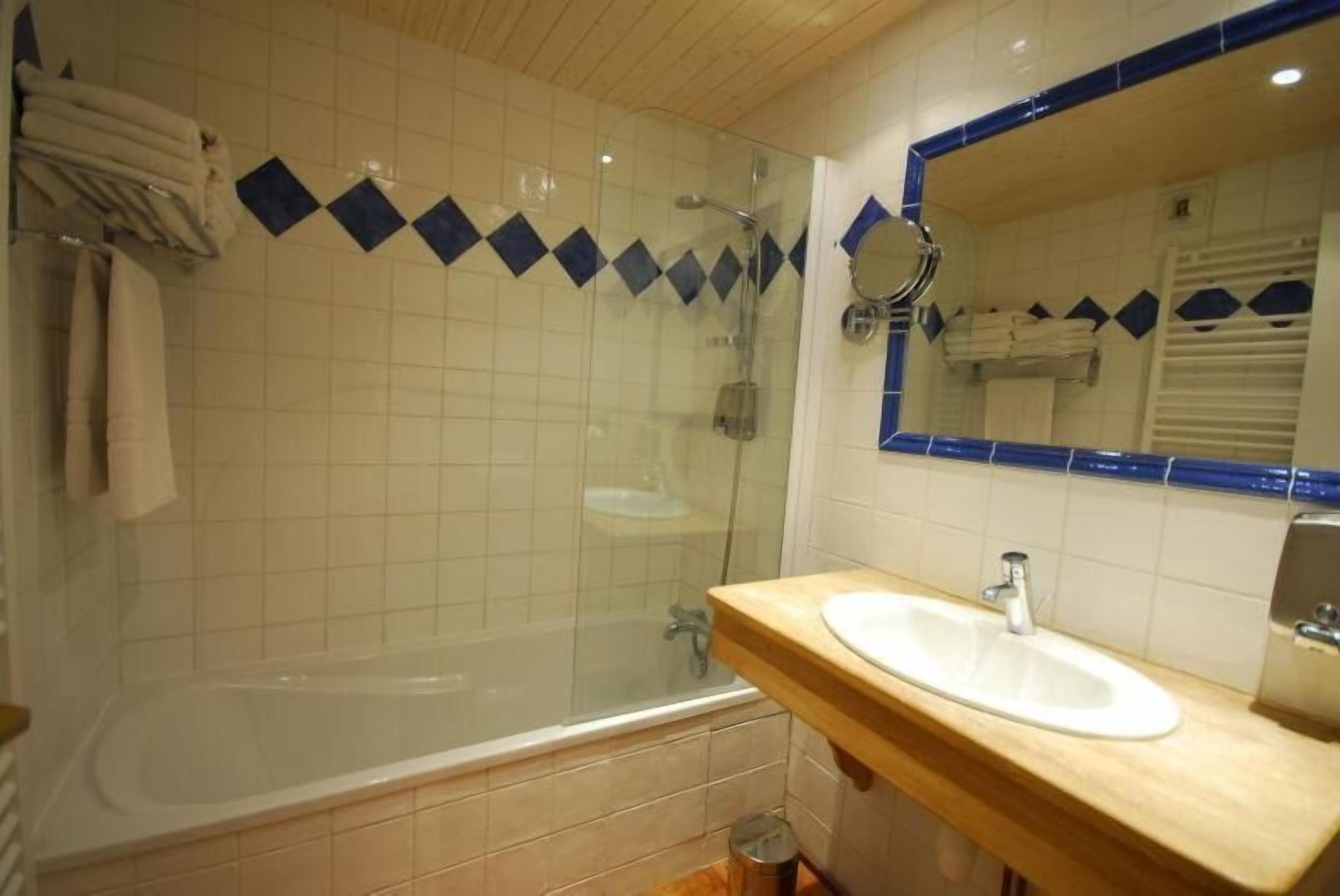 hair dryer, bathrobes, towels