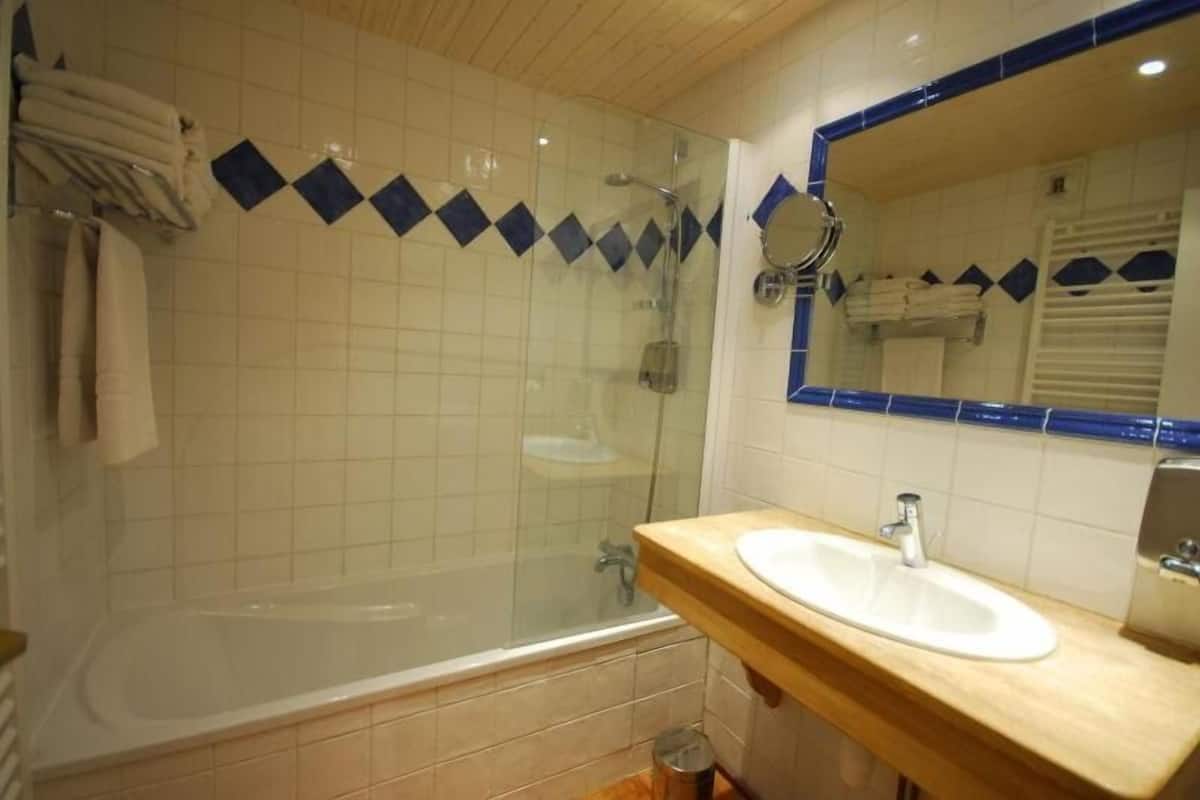 hair dryer, bathrobes, towels